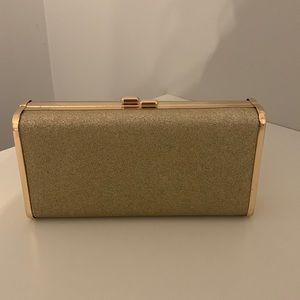 Gold sparkly clutch with chain